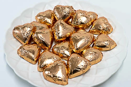 Paul's Confectionery Chocolates - Milk, Dark & White Hearts - Milk Chocolate Hearts In Rose Gold Foil